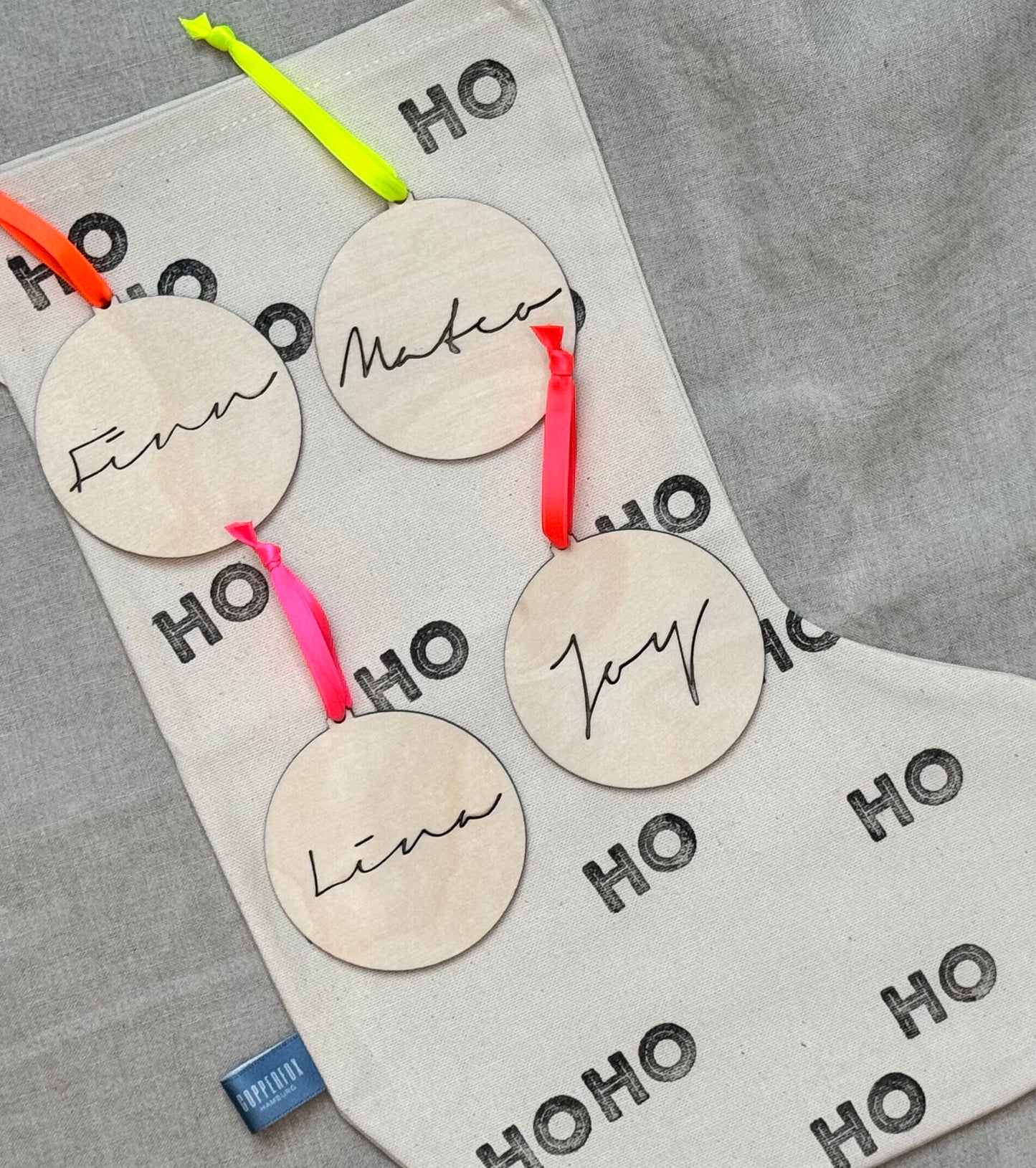 Anhänger mit Namen *ausgestanzt*